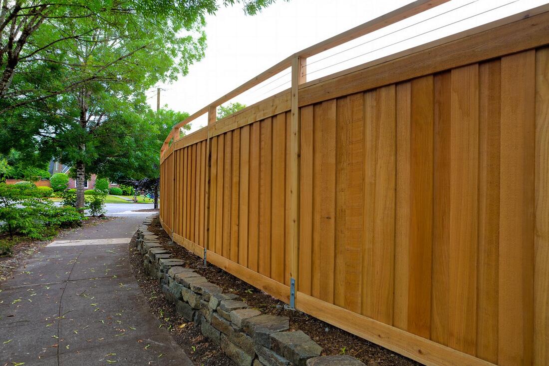 high wood fences of the house